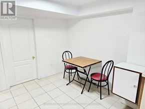 Toronto (Milliken) apartment for rent - A small dining room with a table and chairs.