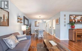 Haldimand apartment for rent - A living room with a grey couch and a wooden coffee table.