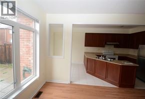Mississauga townhouse for rent - A kitchen area with a counter and a window.