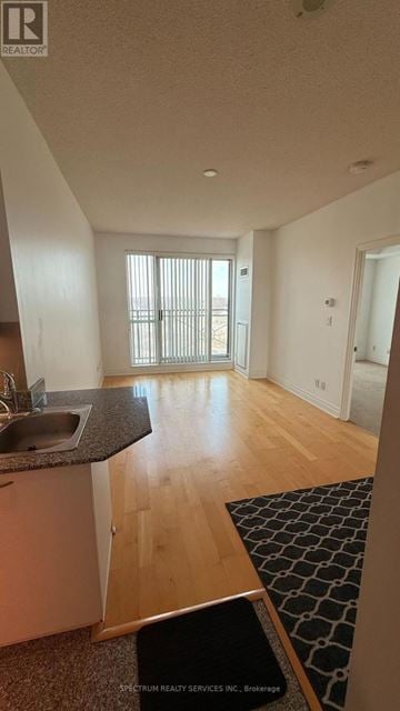 Toronto (Mimico) condo for rent - A kitchen with a sink and a window.