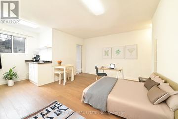 Toronto (Yonge-Eglinton) apartment for rent - A bedroom with a bed, desk, and chair.