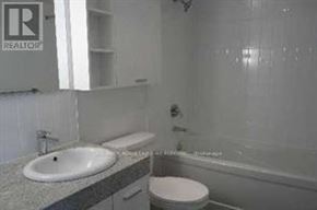 Toronto (Bayview Village) condo for rent - A bathroom with a sink, toilet and bathtub.