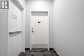 Hamilton (Stoney Creek) townhouse for rent - A white door with a sign on the wall above it.