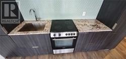 Toronto (Church-Yonge Corridor) condo for rent - A kitchen with a sink, stove and oven.