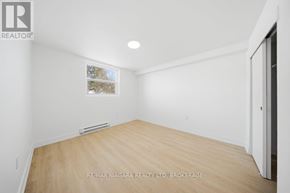 Prince Edward County (Picton Ward) multi-family for rent - A room with a window and a door is for sale.