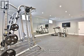 Richmond Hill (Langstaff) apartment for rent - A well-equipped home gym with a variety of exercise machines.