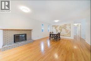 Vancouver apartment for rent - A living room with a fireplace and a large map on the wall.