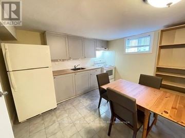 Toronto (Elms-Old Rexdale) apartment for rent - A kitchen with a table and chairs.