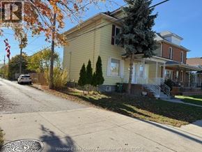 Windsor apartment for rent - A house with a tree in front of it.