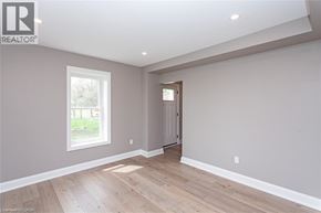 Townsend apartment for rent - A room with a wooden floor and a door leading to another room.
