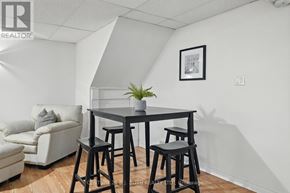 Adjala-Tosorontio (Lisle) apartment for rent - A dining area with a table and chairs.