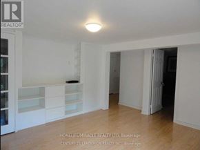 Toronto (L'amoreaux) apartment for rent - A room with a shelf and a light on the ceiling.