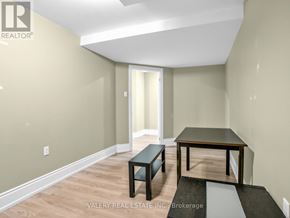 Toronto (Stonegate-Queensway) apartment for rent - A room with a table and two chairs.