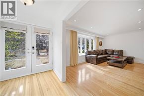 Oakville apartment for rent - A living room with a couch and a coffee table.