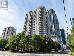 Toronto (Willowdale East) condo for rent - A city street with a large building in the background and a car driving on the road.