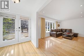 Oakville (Oo Old Oakville) apartment for rent - A living room with a couch and a coffee table.