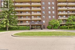 Kitchener condo for rent - The image shows a multi-story building with the number 1100 on it.