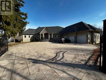 Vaughan (Concord) apartment for rent - A large house with a driveway in front of it.