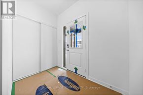 Ottawa townhouse for rent - A room with a white door and a white wall.