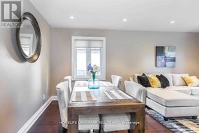 Richmond Hill (Crosby) apartment for rent - A dining room with a wooden table and chairs.