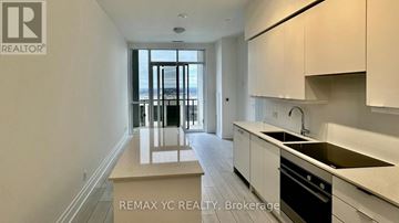 Mississauga (Fairview) condo for rent - A kitchen with white cabinets and a sink.