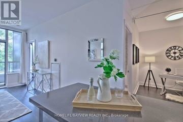 Toronto (Willowdale East) condo for rent - A modern living room with a coffee table in the center.