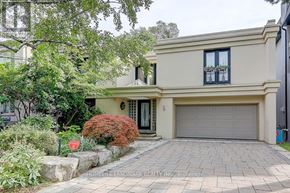 Toronto (Forest Hill South) apartment for rent - A two-story house with a garage and a driveway.
