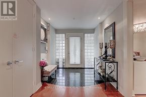 Toronto (Forest Hill South) apartment for rent - A hallway with a bench and a mirror on the wall.