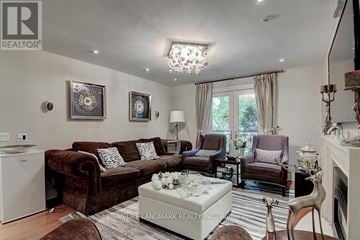 Toronto (Forest Hill South) apartment for rent - A living room with a brown couch and a white coffee table.
