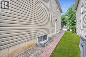 Waterloo apartment for rent - A house with a realtor logo on the side.