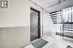 Waterloo apartment for rent - A black door with a silver handle is on the left side of the image.