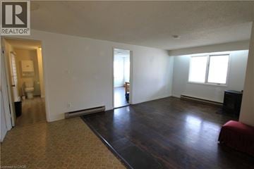 Woolwich apartment for rent - A living room with a couch and a television.