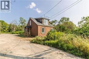 Glanbrook apartment for rent - A house with a driveway in front of it is for sale.