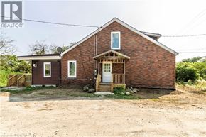 Glanbrook apartment for rent - A brick house with a porch and a door is for sale.