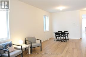 Pickering apartment for rent - A room with a table and chairs in it.