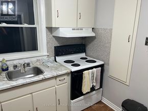 London East (East H) apartment for rent - A kitchen with a stove and sink.