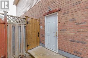 Brampton (Fletcher's Creek South) apartment for rent - A white refrigerator in a room with white walls.