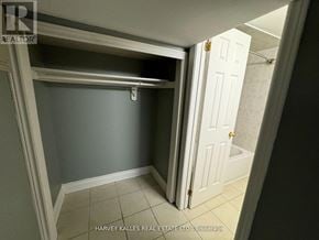 Toronto (Dovercourt-Wallace Emerson-Junction) apartment for rent - A small room with a door and a window.