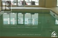 Ottawa condo for rent - A glass table with a logo on it.