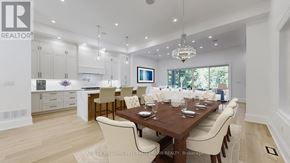 Toronto (Bedford Park-Nortown) apartment for rent - A modern dining room with a wooden table and chairs.