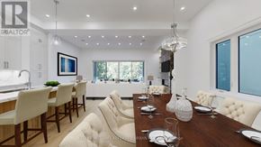 Toronto (Bedford Park-Nortown) apartment for rent - A dining room with a wooden table and white chairs.