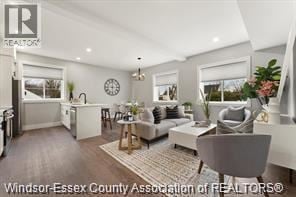 Essex apartment for rent - A well-lit, modern living room with a grey sofa and a coffee table.