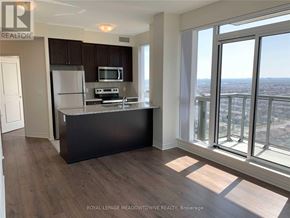 Mississauga (Creditview) condo for rent - A kitchen with a refrigerator, microwave, and oven.