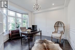 Vaughan (Kleinburg) apartment for rent - A well-lit room with a table, chairs, and a chandelier.