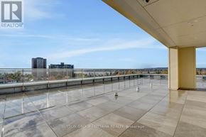 Ottawa condo for rent - A rooftop with a glass floor and a view of the city.