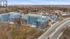 Toronto (Centennial Scarborough) condo for rent - A Re/Max Hardmark Group building is shown from an aerial perspective.