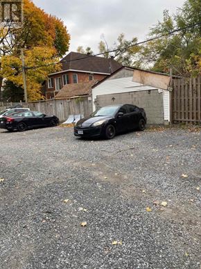 Ottawa townhouse for rent - Two cars parked in a driveway.