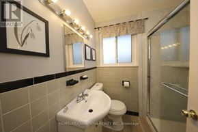 Toronto (Eglinton East) apartment for rent - A bathroom with a sink, toilet, and shower.