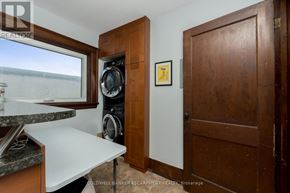 Halton Hills (Ac Acton) apartment for rent - A small room with a washing machine and a dryer in it.