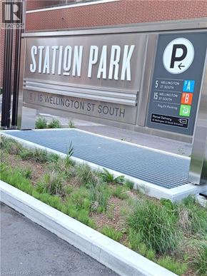 Kitchener condo for rent - A sign for Station Park with Wellington St South written on it.